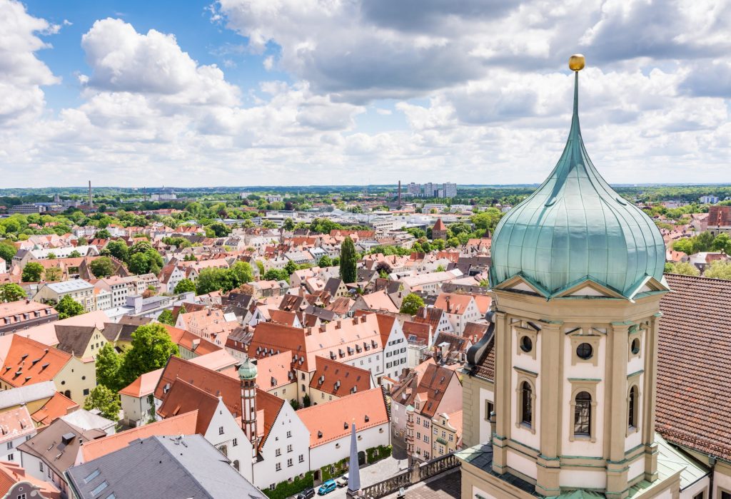 Aerial view over Augsburg with the tower of the old town hall.